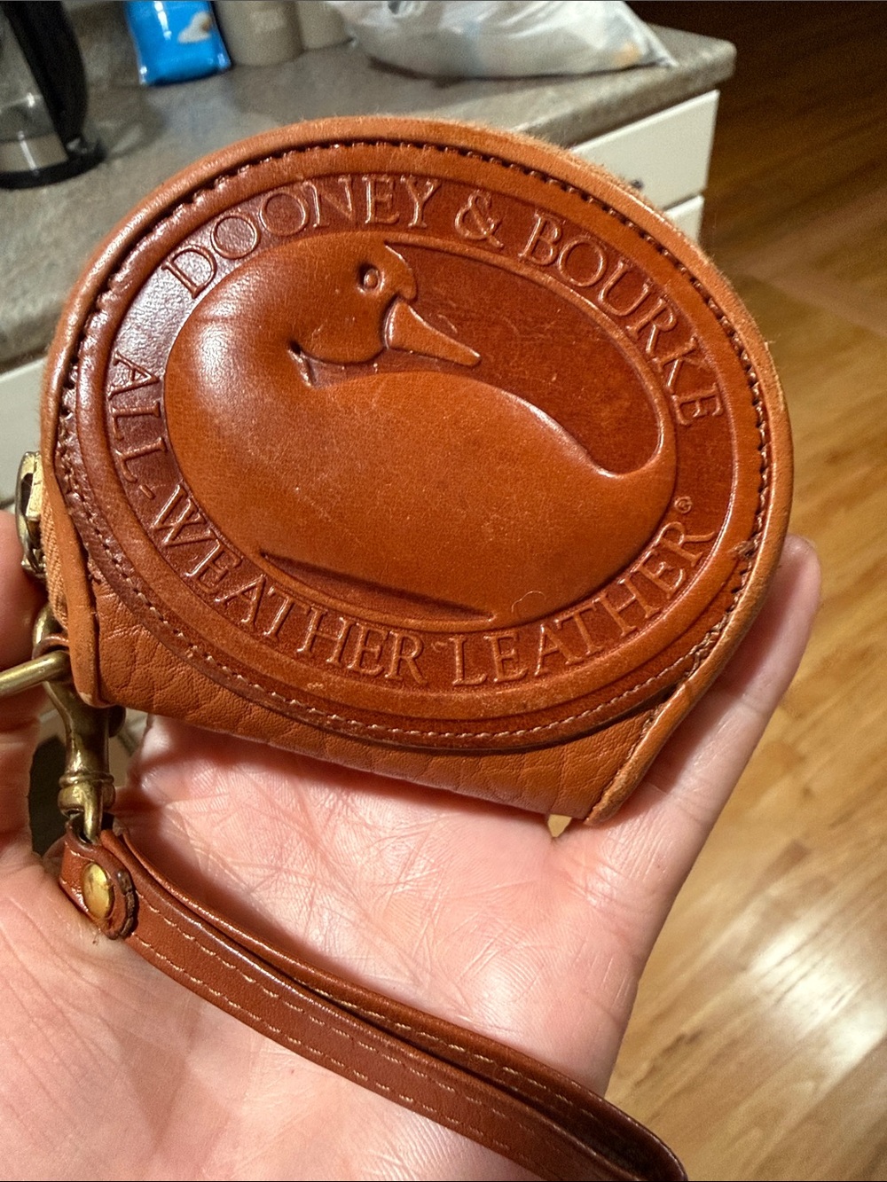 Vintage Dooney & Bourke Saddle Brown Embossed Round Leather Wristlet